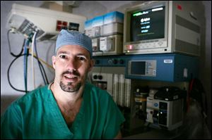 Doug Boston, a Lourdes College graduate, is a surgical nurse at Flower Hospital. Two years ago, he donated a kidney to the husband of a co-worker, who was stunned by his generosity.