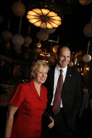 ORDER IN THE COURT: Judith Lanzinger and Gary Cook look at the merits of the Gridiron preparty.