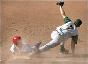 St. Francis' Johnny Kontak is out trying to get back to first after a line drive to short. Clay's Corey Trout completes the play.