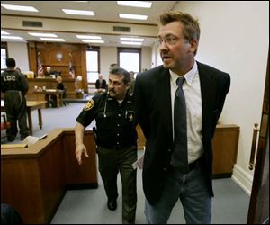 John  Mitch  Balonek tells supporters in the gallery he loves them as he is escorted out of the courtroom.
