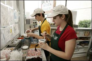 Matthew Curcio, left, and Ashley Speelman have returned for another summer at Lickity Split. 