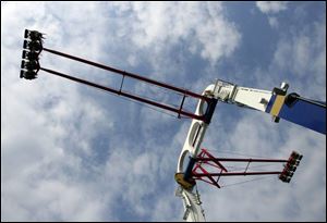 The park s new Skyhawk ride is more than 100 feet tall, and features two 85-foot-long swinging arms, each of which holds 20 riders. They are positioned back-to-back, so every rider has a  front row  view. As the arms swing back and forth on the two-minute ride, passengers are propelled more than 125 feet into the air at speeds of more than 60 mph. 
