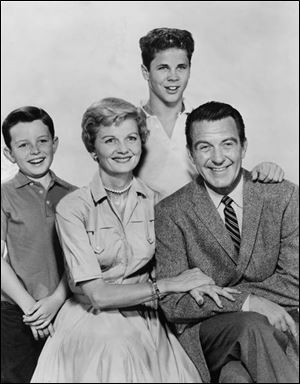 Shirtdresses were almost a uniform for the moms on '50s TV shows, like June Cleaver.