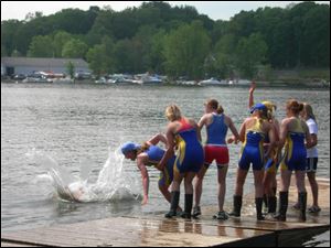 Coxswain Alex Thornton gets tossed into the water by her St. Ursula crew after she led them to a victory in New York.