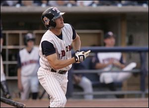 Ryan Ludwick breaks his bat for a good cause - a two-run homer in the seventh inning.