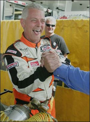 Chuck Weber of Texas celebrates his first career pole for today's ARCA/REMAX race at Michigan International Speedway.