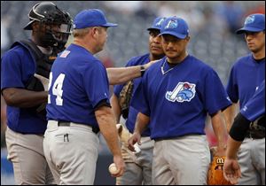 Yusaku Iriki gets knocked out of the second game. It was his first Triple-A game after a 50-game suspension.
