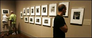 Mike Fanning of Cincinnati takes in the Museum of Art's exhibit of nature photographs by Ansel Adams.