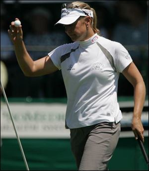 Annika Sorenstam is four shots behind the leaders.