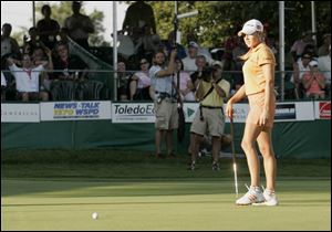 Natalie Gulbis watches as her putt on the third playoff hole refuses to fall and sends her to a second-place finish in the Farr. A run of five straight birdies on the front nine yesterday gave her a big lead, but she had nothing but pars after No. 10.