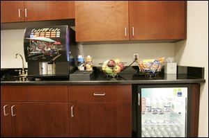 Complimentary fruit, bottled water, and a choice of coffees are part of the service at the Sylvania Township Lexus dealership.