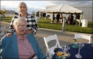 ON THE ROOF: Mary Pat and Tom Anderson wait for guests so they can spend a midsummer night on the roof.