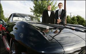 'VETTE FANS: Doug Brainard, left, and Steve Jagodzinski admire Mr. Brainard's 1963 Sting Ray during the Glass City Corvette Club's 40th anniversary bash.