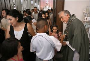 The Rev. Richard Notter of Ss. Peter and Paul says there once was an inferiority complex in the Latino community.