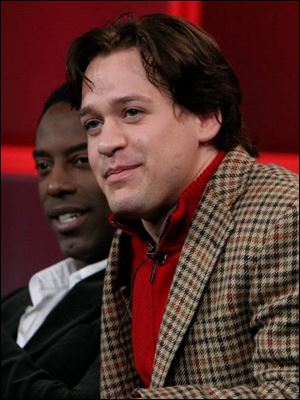 T.R. Knight, front and Isaiah Washington of <i>Grey's Anatomy</i>.