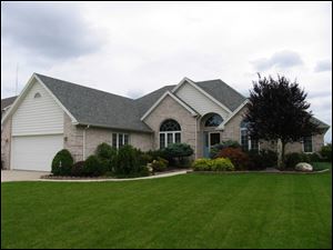 The home at 1718 Grand Bay is offered at $299,900 by Welles Bowen Realty. It will be open Sunday, July 30, from 2 to 4 p.m. 