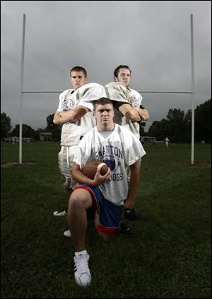 Jordon Stinson, back left, and Josh DoMoe, along with Chris Goin, front, were key in helping Swanton knock off Lake. 
