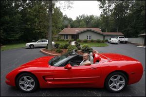 Bob Richard shows off both home and car near Whitehouse.
