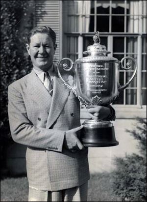 Byron Nelson displays his 1940 PGA trophy. He told The Blade in 2001 he considered Inverness his home course.
