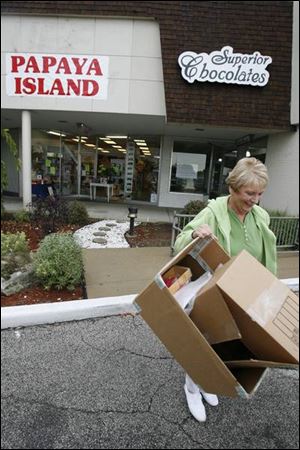 Vicky Johnson prepares for a move from Papaya Island.
