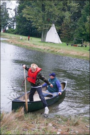 Nathan Wenz, left, and his father James enjoy some canoeing.