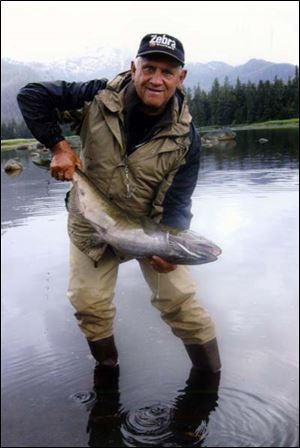 John Sinkovic displays one of the many fish they caught. In four months, they only ate in restaurants four times.
