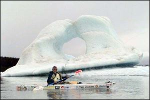 John Sinkovic kayaks among the hundreds of icebergs at Yakutat Glacier in Alaska. Sinkovic and his friend, Mike Pasztor, explored many of the waterways using their kayaks.