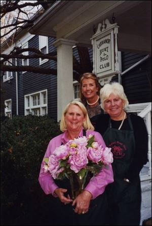 Tina Black, left, Cindy Taylor, and Deanna Radeloff at the
Country Garden Club Holiday Trunk Show preview.
