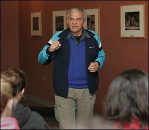 Eddie Daniels speaks to seniors at Maumee Valley Country Day School about the apartheid fight.