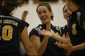 Busch holds school career marks for digs (719), aces (189) and kills (815). She broke the kills mark of 785 which was set by her sister, Emily.

