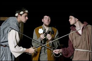 Brad Arner, left, Kevin Little and Mike Yeary perform in the University of
Toledo s production of Romeo and Juliet, which has a seven-member cast.