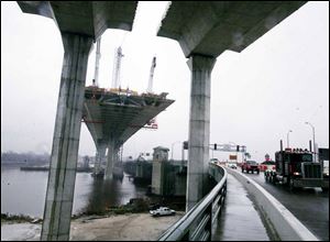 ODOT's current schedule calls for the Veterans' Glass City Skyway over the Maumee River to open to traffic by mid-spring.