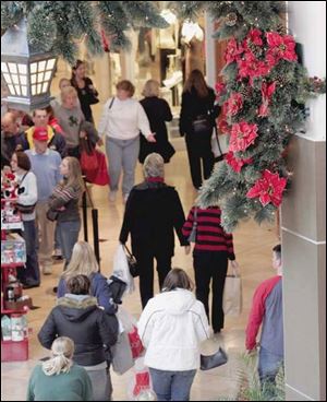 Shoppers crowded Toledo's Westfield Franklin Park on last year's 'black Friday.'