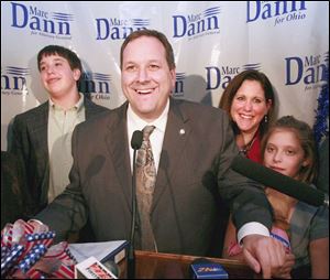 Marc Dann, center, and family, from left, son David, wife Alyssa Lenhoff-Dann, daughter Jesse. 