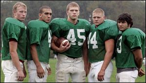Oak Harbor running backs, from left, Andy Warns, Aaron McCune, Jake Lipstraw, Matt Bloomer and Tom Baker have helped the Rockets compile 3,155 yards on the ground.
