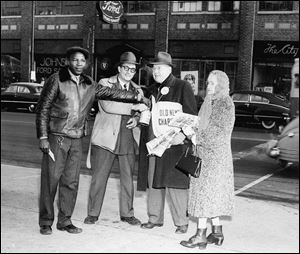 In this photo from about 1950, Old Newsboys Goodfellow Association members hawk newsletters to raise money to buy needed items for children suffering from neglect or poverty.
