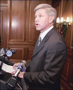 Jim Welling, former Owens athletic director and basketball coach, meets with the media at the Toledo Club.