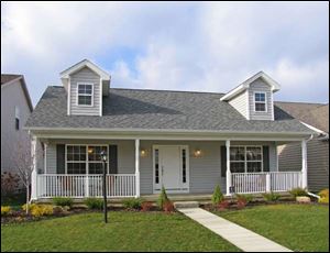 The home at 5637 Breezy Porch is offered at $183,500, including lot, and can be seen during regular office hours, Monday through Friday, from 9 a.m. to 4 p.m. For a private appointment, contact Mike Hojnacki at 419-467-3421.