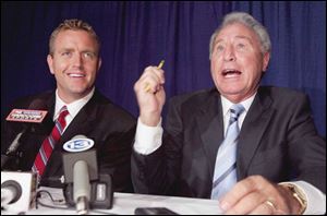 Kirk Herbstreit, left, and ESPN sidekick Lee Corso answer
questions prior to the Italian American Sports Club banquet.
