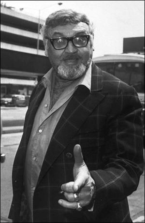 Singer Frankie Laine is shown in June, 1975, at Heathrow Airport as he returns home to California after an 8-week stay in Britain.