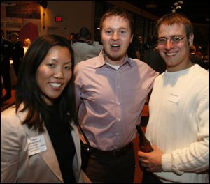 Tanya Pipatjarasgit, left, Kris Keating, and CJ Murawski at the EPIC Toledo reception.
