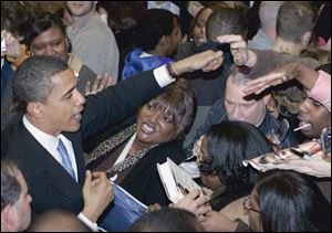 Democratic presidential hopeful Barack Obama greets supporters
at Cuyahoga Community College in Highland Hills, Ohio.