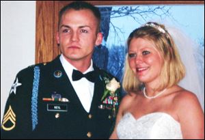 Matthew and Tracy Keil were
married just weeks ago. He was
seriously wounded in Iraq on Friday.