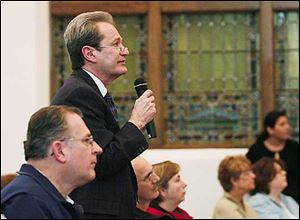 John Sherburne, Finance Director, gave a powerpoint presentation.