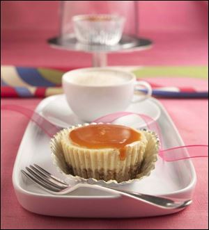 Caramel-Topped Cheesecakes with Oat-Pecan Crust won the Quaker Oats  For Your Heartthrob  recipe contest.