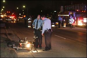Toledo police investigate the accident, which was reported about 9:10 p.m. and closed a section of Laskey several hours.