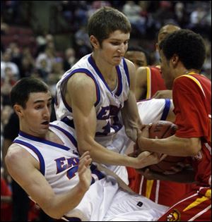 Liberty-Benton s Nathan Hyde, left, and Pat Wallace battle Nate Glover of North College Hill for the ball. Hyde, co-player of the year in Division III, scored 26 points to lead the Eagles.