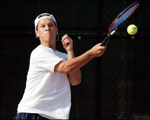 Rollin Urrutia teamed up with Brian Meyer to win the City League and district doubles titles, then finished third in the Division I state tournament.