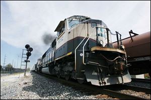 Holland averages about 95 train passings daily, according to Councilman Brian Summerson.
