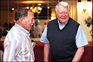 Andy Wongrowski, left, chats with 1945 class president Harry Mills. Attendees gathered at the Bayside Boardwalk in Oregon.